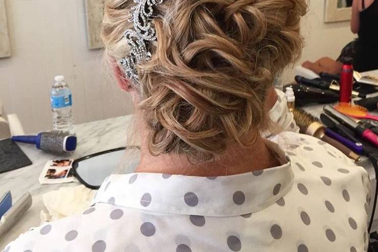 Braided updo with hair ornament