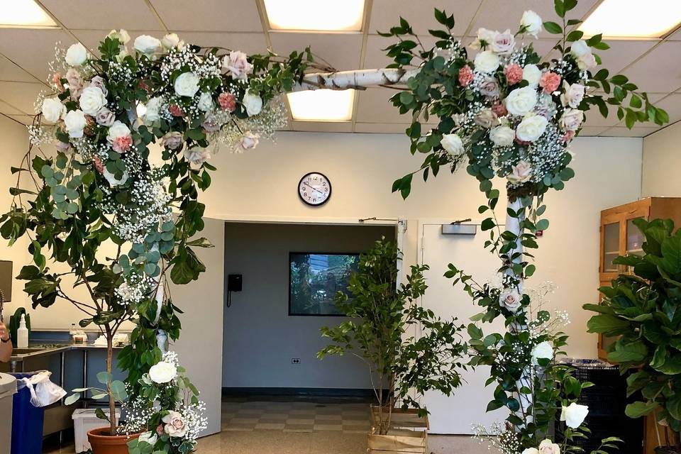 Romantic ivory wedding arch