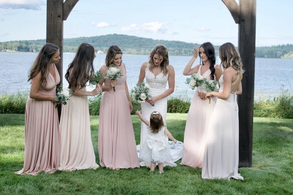 Bridesmaids with flower girl