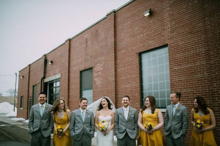 The couple with the bridesmaids and groomsmen