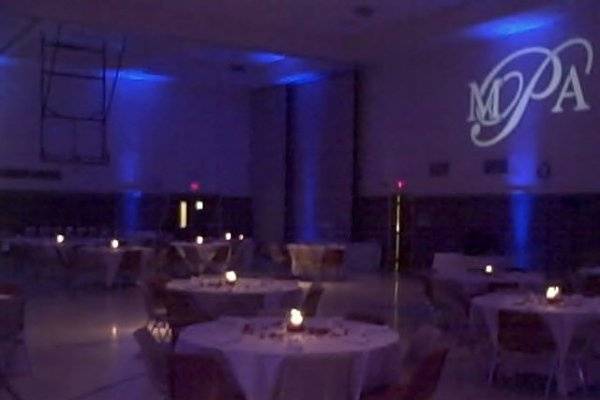 This room is actually a gymnasium that has been transformed by UpLights and a GoBo Monogram light.