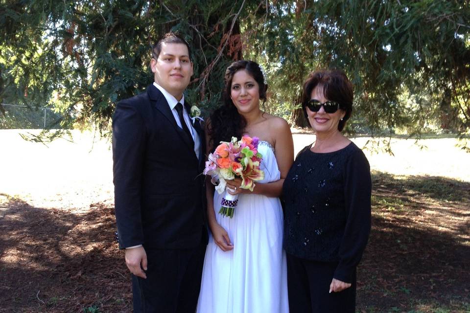 Couple with the officiant