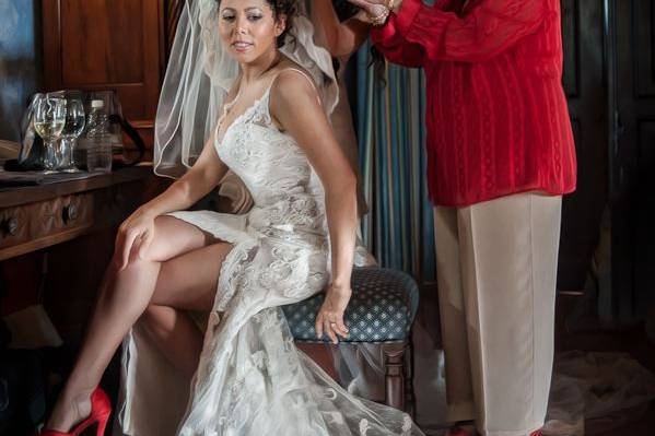 Evette's Grandmother and I placing Evette's veil.