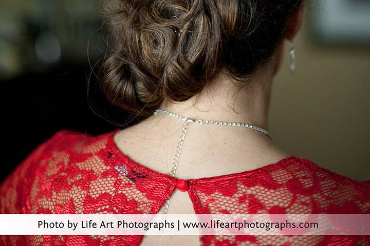 Back of Ildiko's hair. Updo with real flowers for her Hungarian Wedding.