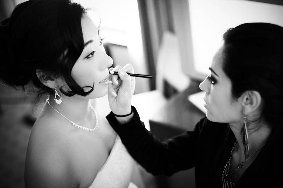 Jinny, getting a little lip color to complete her look.