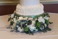 White wedding cake with white flowers