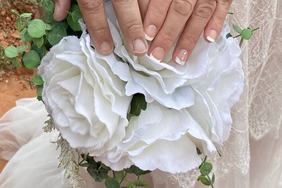 Ring shot over wedding flowers