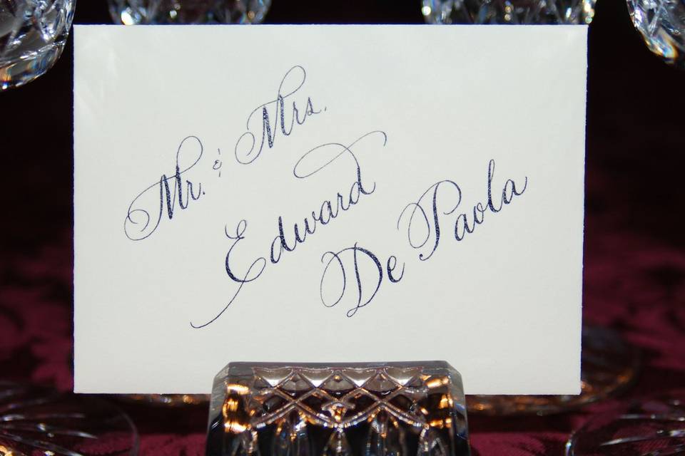 Escort Envelopes with lettering on a slant.