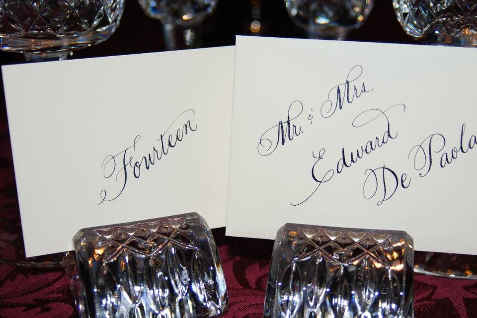 Escort Envelopes with lettering on a slant.