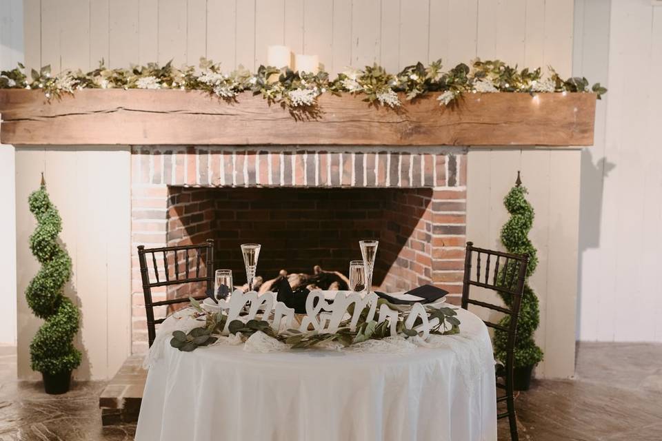 Head table in front of fireplace
