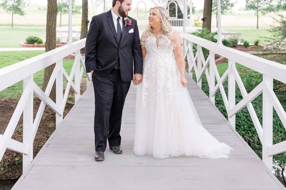 Bride & groom on bridge