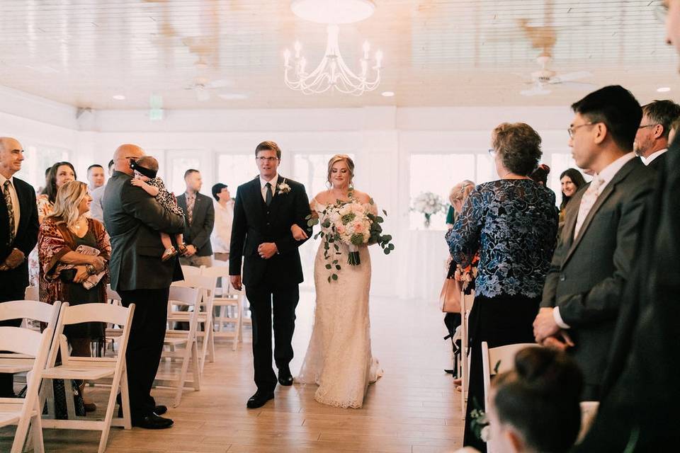 Bride walking down in Atrium