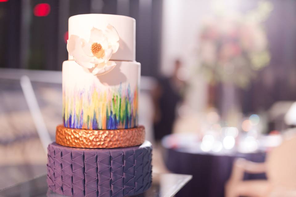 This beautiful cake, by Adorn Cakes, pulls influence from the Museum and the wedding colors