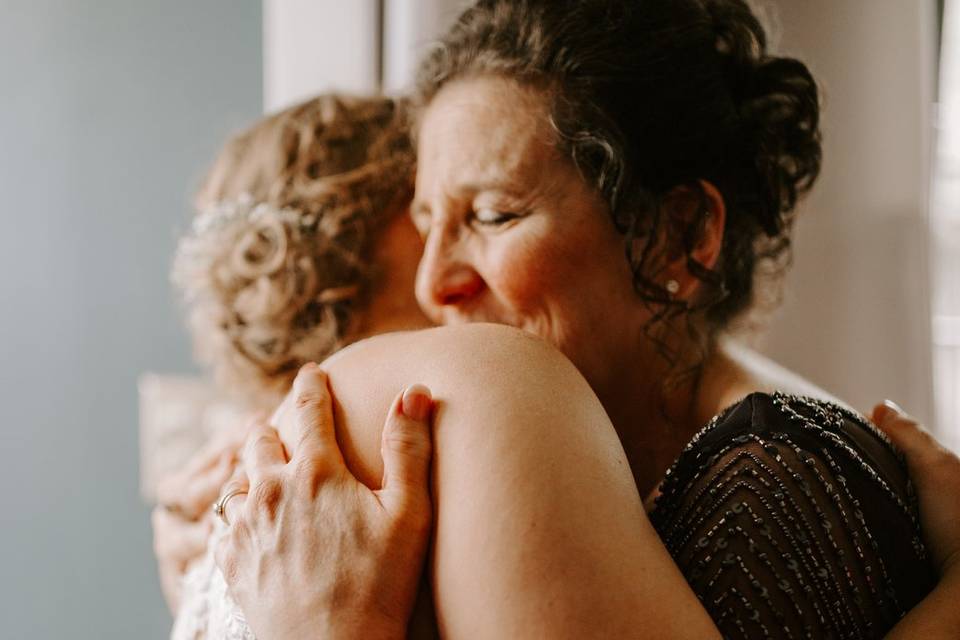 Mother and daughter embrace