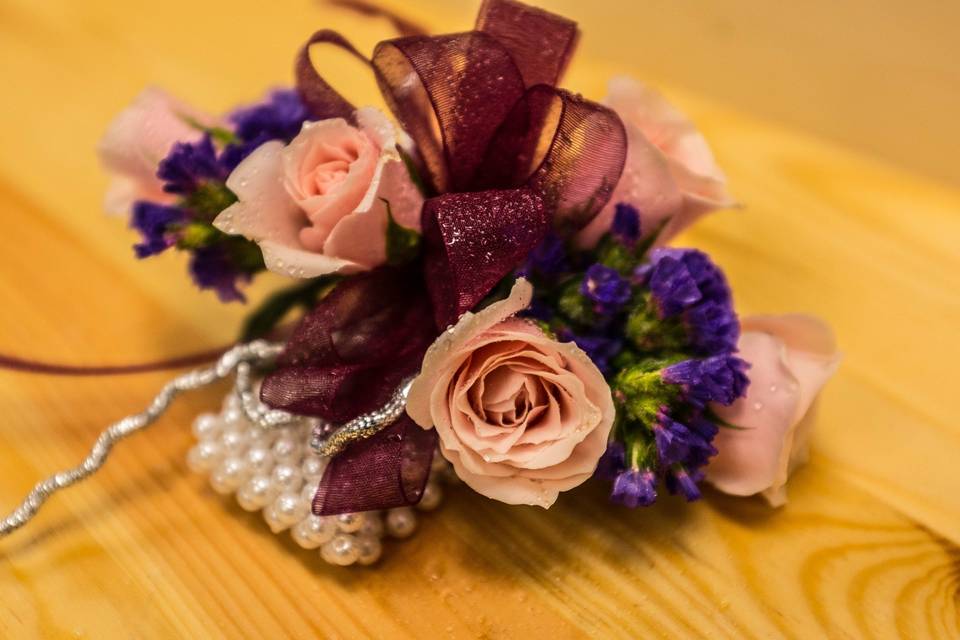 Wrist corsage - baby roses, statice