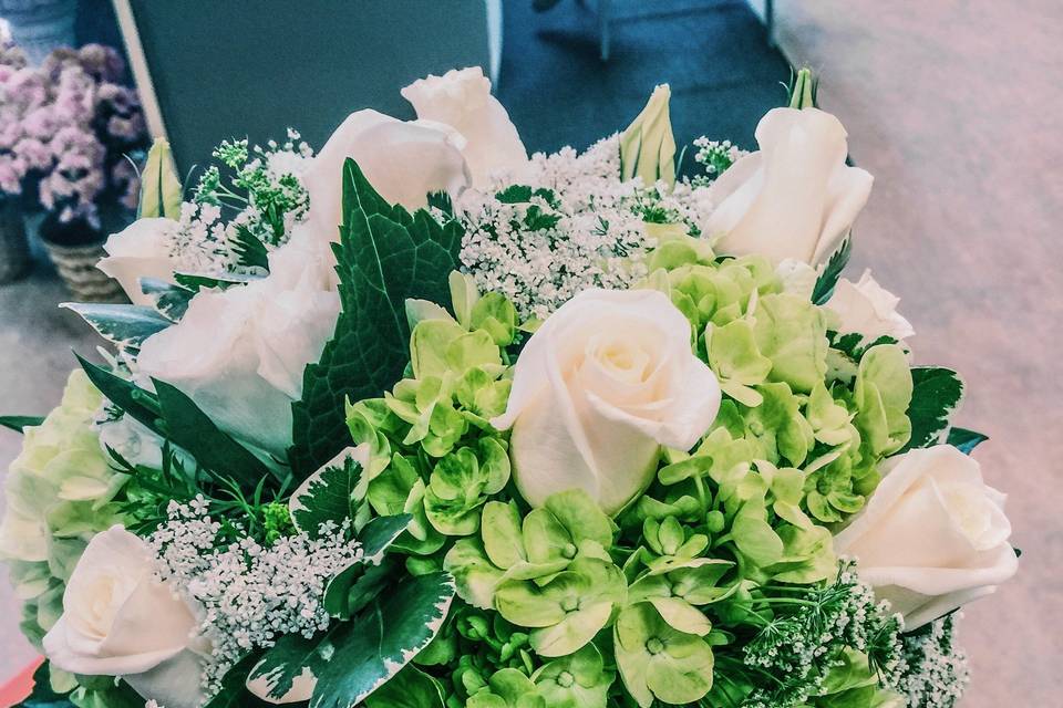 Hand-tied bridal bouquet - roses, hydrangea, lisianthus