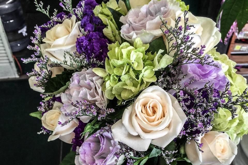 Hand-tied bridesmaid bouquet - hydrangea, baby's breath