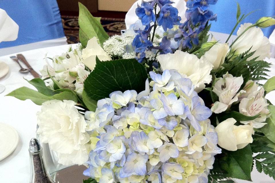 Centerpiece - hydrangea, baby roses, delphinium, lisianthus