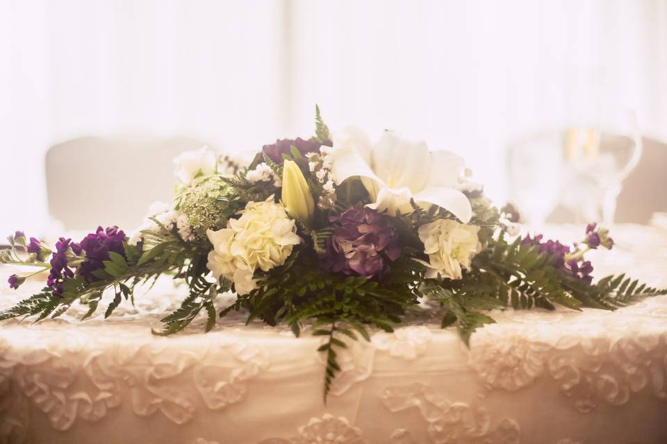 Sweetheart table centerpiece - hydrangea, lilies, roses, stock