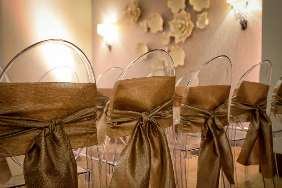 Ceremony chairs and linens styled by Forté Events.