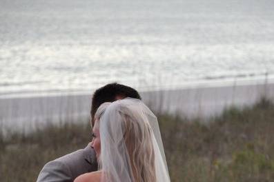 Newlyweds by the rails