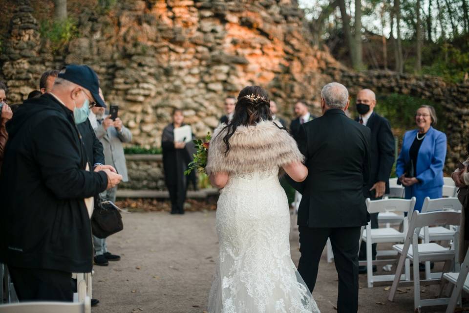 Sarah and her dad walking up t