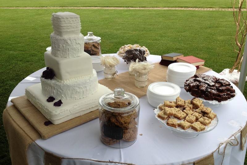 Dessert table at a rustic themed wedding - sunset view resort