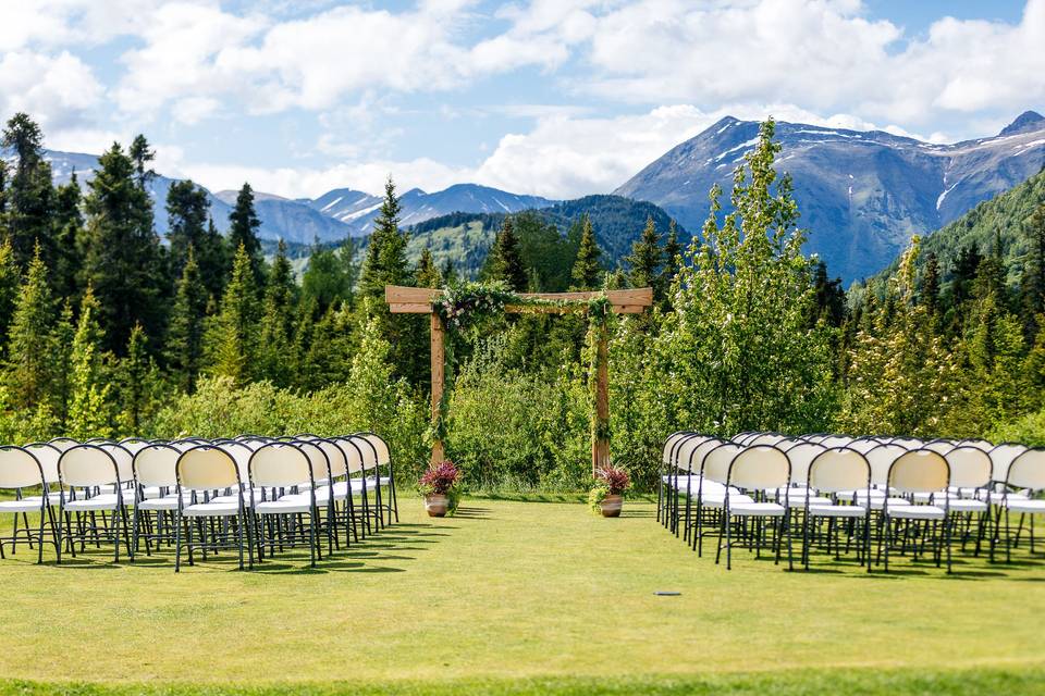 Outdoor open air photo booth setup under a canopy