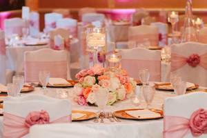 Pink and white table setup