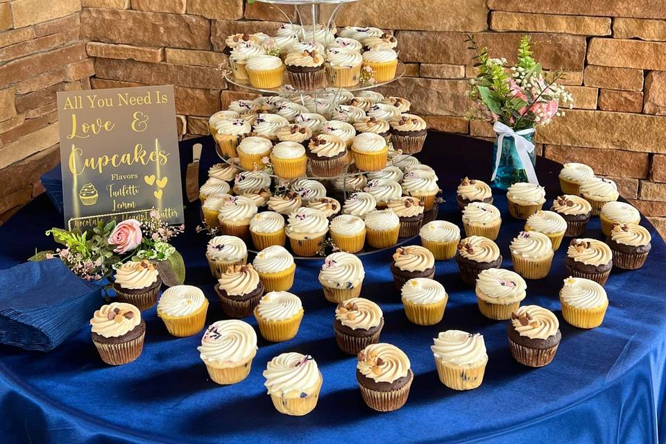 Cutting Cake with Cupcake Towe