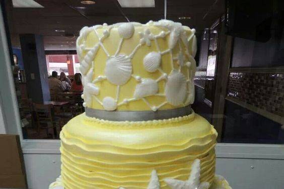 Yellow sea-themed wedding cake