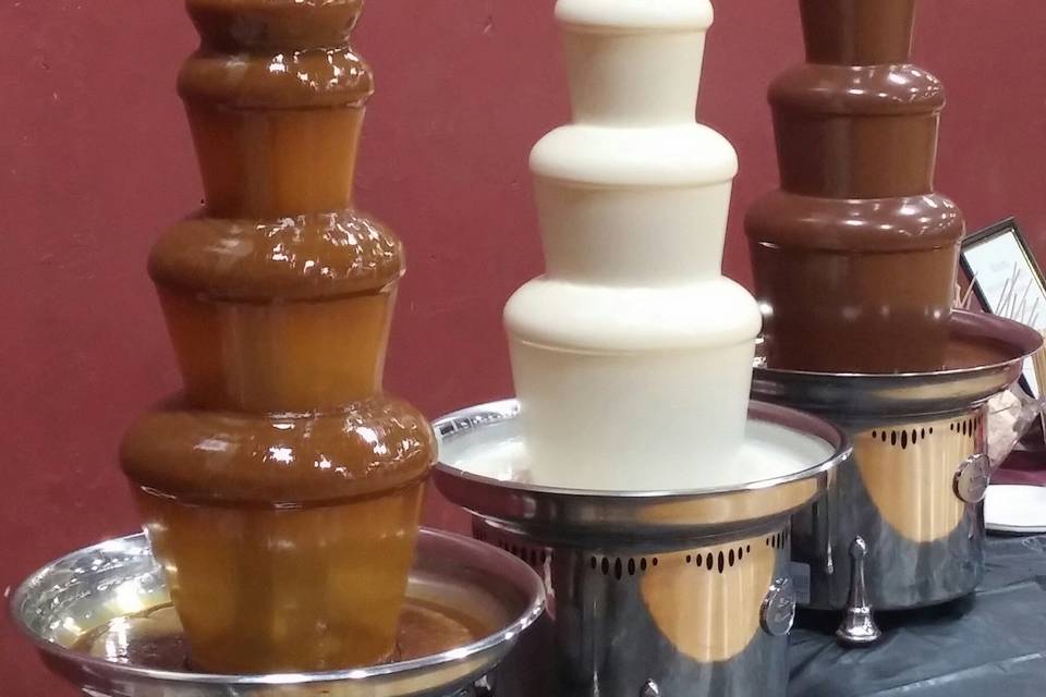 Small caramel, white chocolate and blended chocolate fountains.