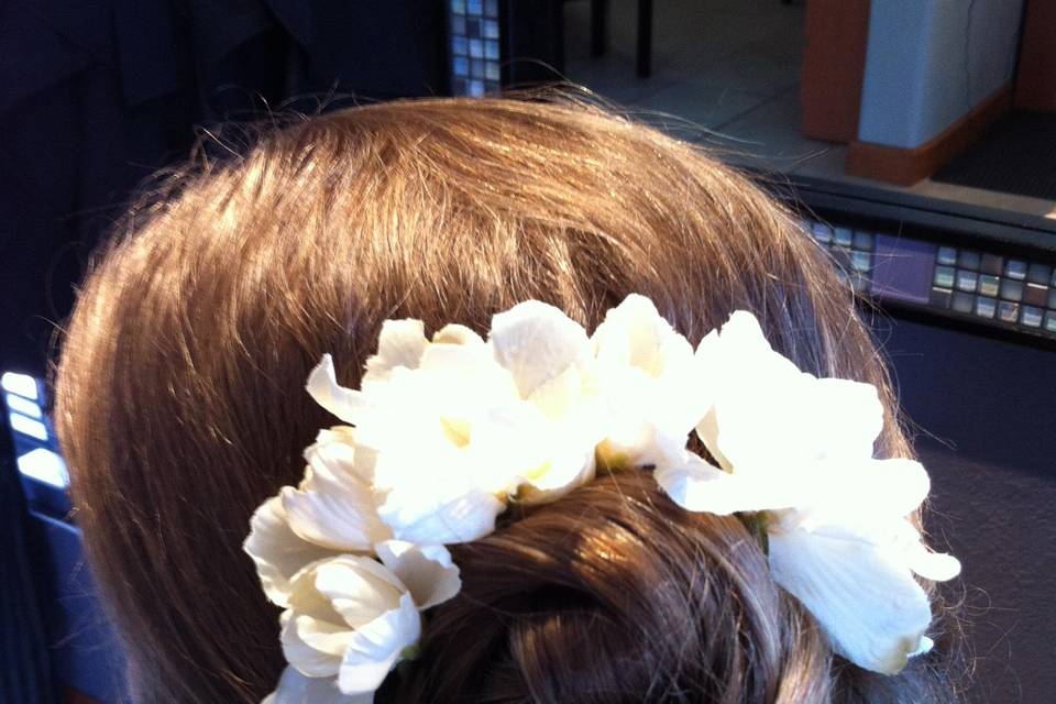 Updo with fresh flower accents
