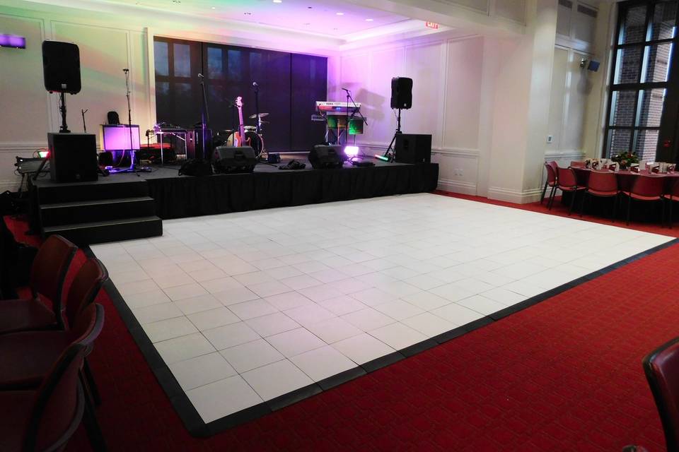 White, faux-slate sectional dance floor. Economical, quick installation. Flexible sizing to fit almost any space.