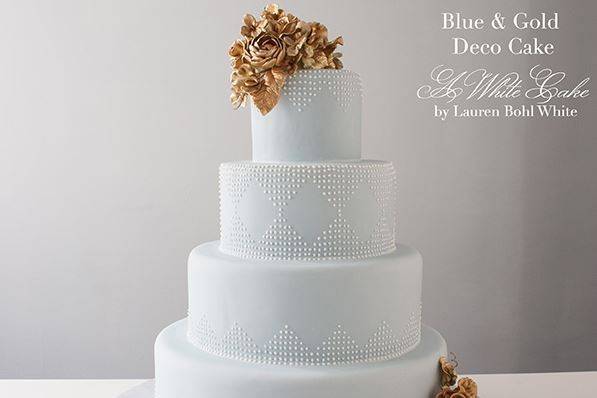 Light blue and gold cake