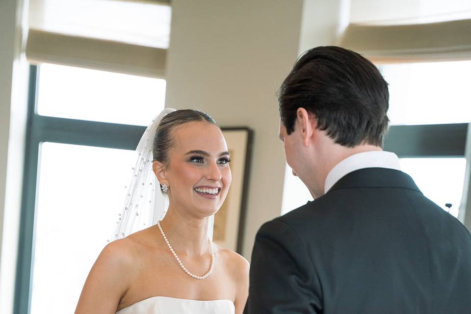 Bride smiling at first look
