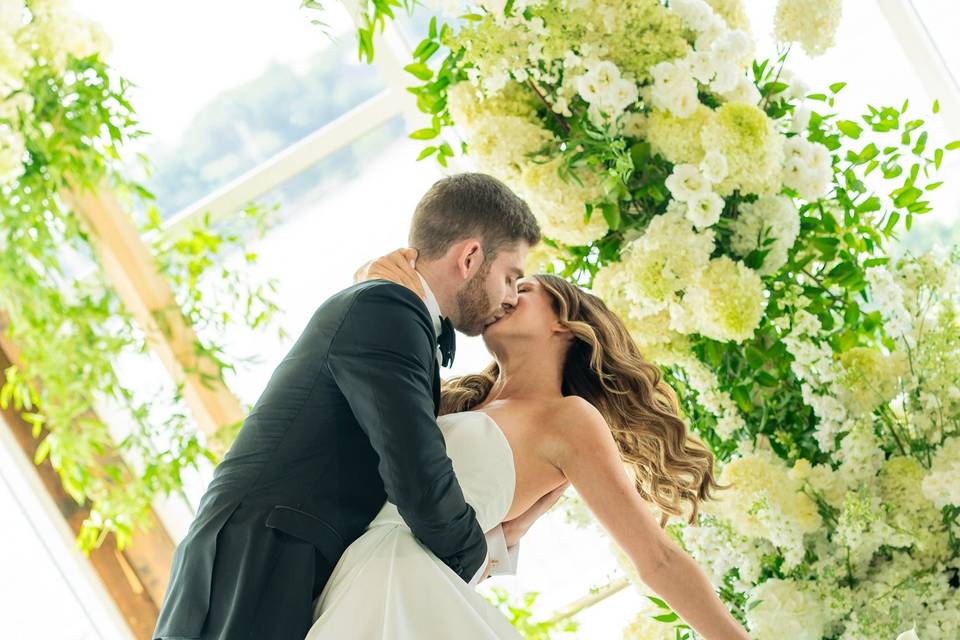 Groom dips bride
