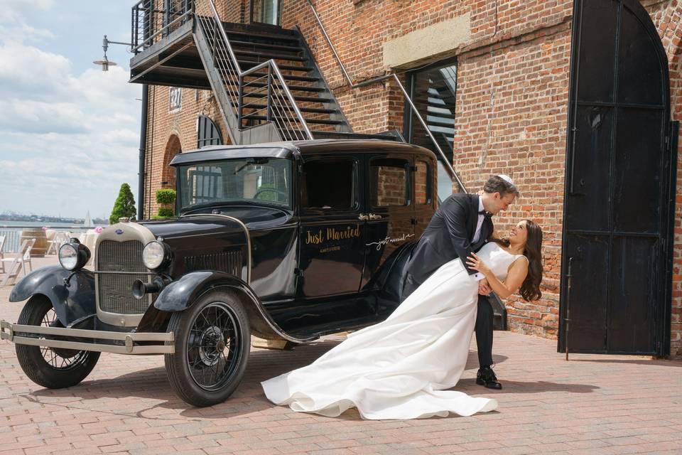 Groom dips bride