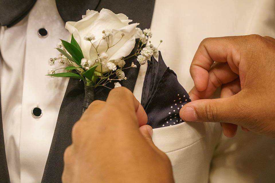 Groom getting pocket square