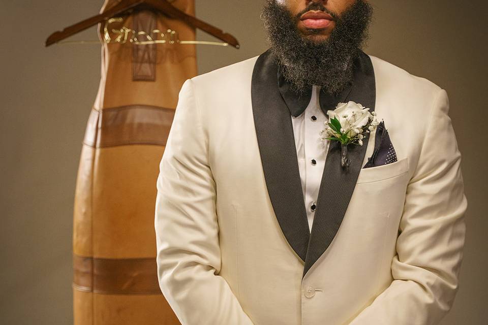 Groom with punching bag
