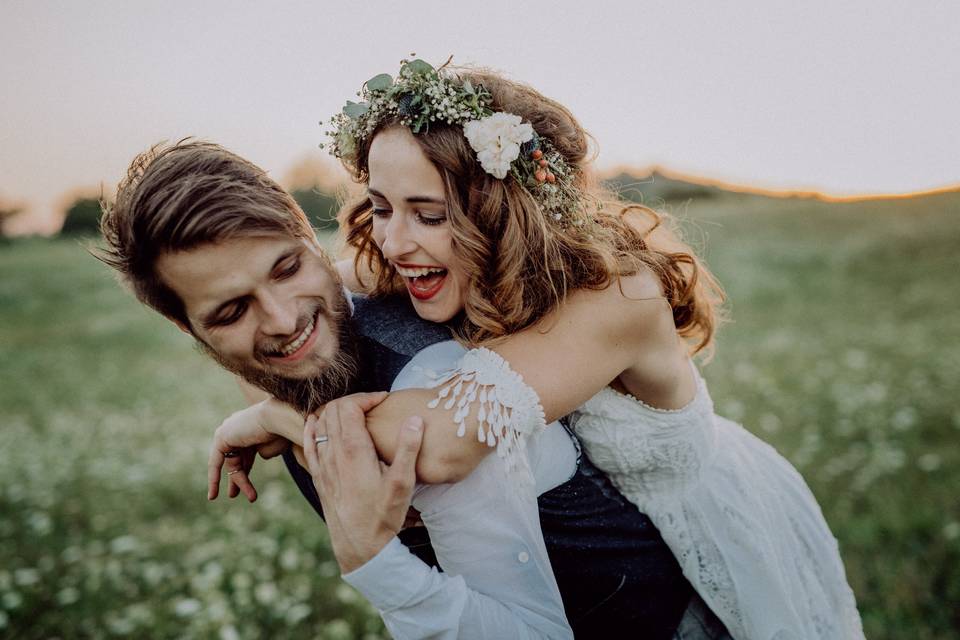 Couple playing after ceremony - Alex James Prior