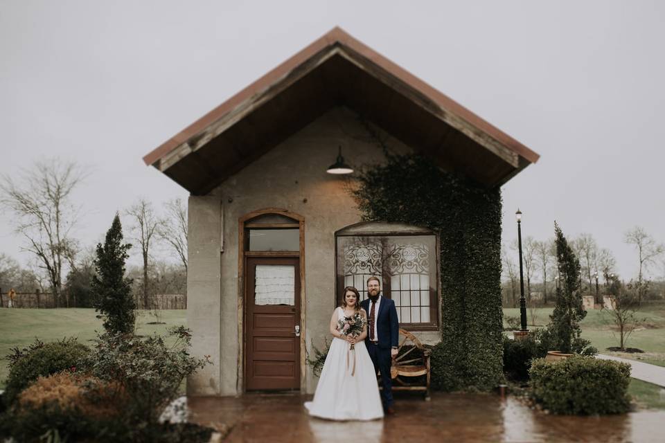 Portrait of the couple before a building