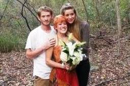 Mr. & Mrs. McIntyre, & their officiant Rae.