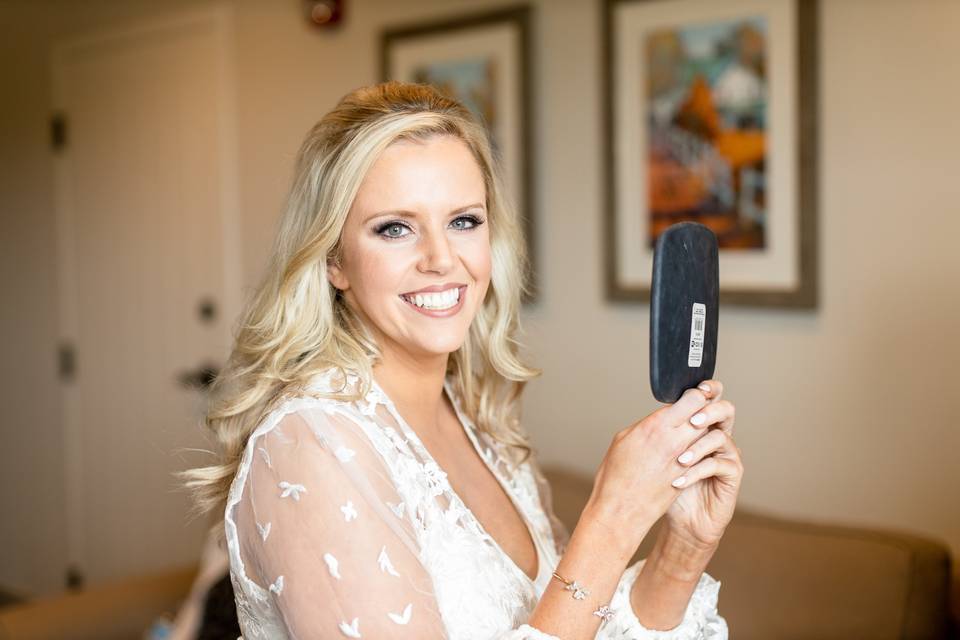 Bride getting makeup done