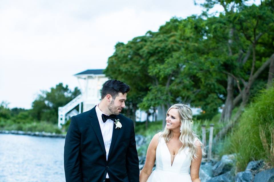 Bride & Groom walking on beach