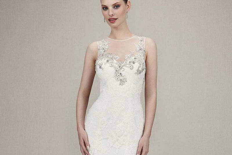 Style Kaitlyn <br> Alencon lace and tulle trumpet gown showcases beaded illusion sweetheart neckline. Soft tulle overlay complements low illusion back. Finished with delicately scalloped hem lace.