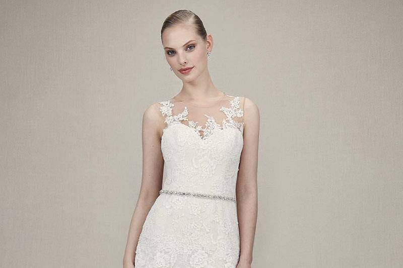 Style Karina <br> Full-length A-line gown updated with Alencon lace, Chantilly lace and tulle. Thin beaded belt attached at waist complements illusion sweetheart neckline and low illusion back with embroidered lace.