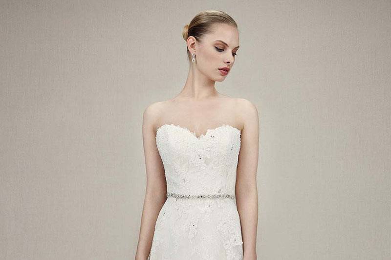 Style Karissa <br> Full-length A-line gown features sweetheart neckline, thin beaded belt attached at the natural waist, as well as all-over beaded Alencon lace, Chantilly lace, and soft tulle.