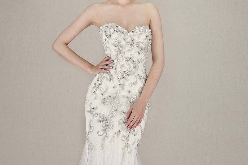 Style Kerianna <br> Full-length Chantilly lace mermaid gown features classic sweetheart neckline on intricately beaded embroidered lace bodice. Romantic tulle skirt is highlighted by low V-back and invisible zipper.