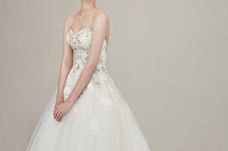 Style Kerianna <br> Full-length Chantilly lace mermaid gown features classic sweetheart neckline on intricately beaded embroidered lace bodice. Romantic tulle skirt is highlighted by low V-back and invisible zipper.